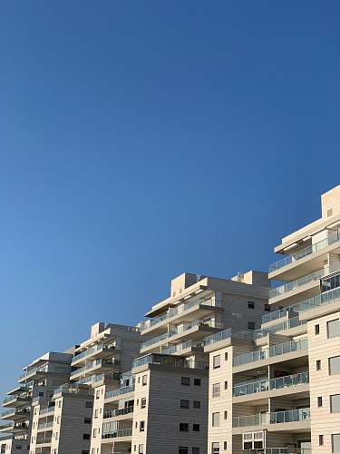 city white high rise buildings high rise