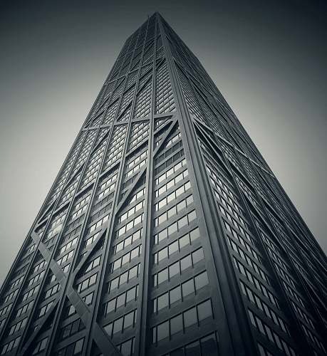 skyscraper worm's eye-view photography of gray high-rise building architecture