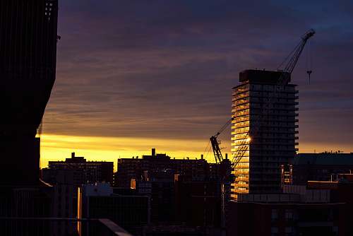 city yellow sunset above high-rise buildings urban