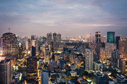 building aerial photography of high-rise buildings under cloudy sky thailand