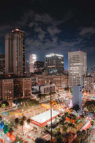 building aerial photography of lighted city during night downtown