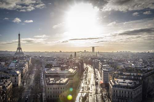 paris aerial view of city buildings sun