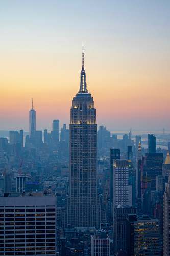 building aerial view of highrise building during sunset town
