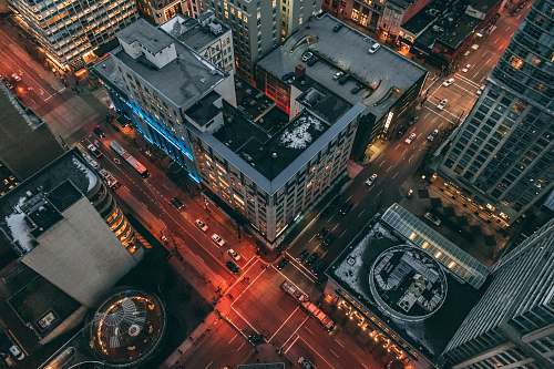 road aerial view photography of highrise building intersection
