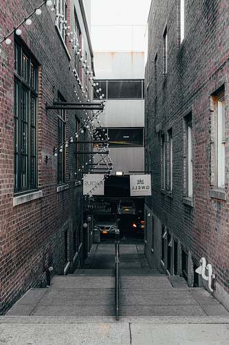 building alley road between buildings road