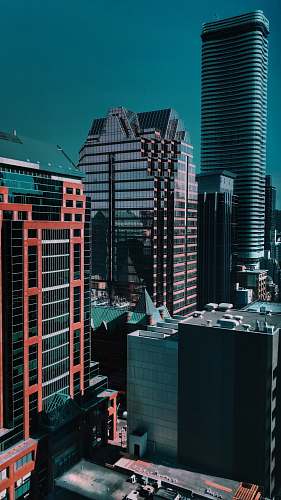building architectural photography of black and brown building high rise