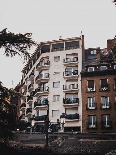 building beige concrete building high rise