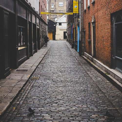 road black and brown concrete building street