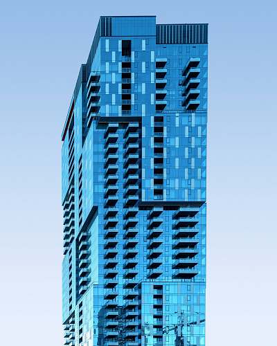 building blue concrete building close-up photo urban