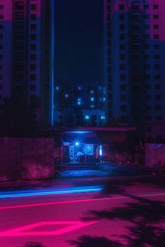 metropolis blue light building during nighttime lighting