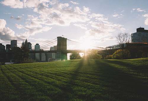 building Brooklyn bridge during daytime field
