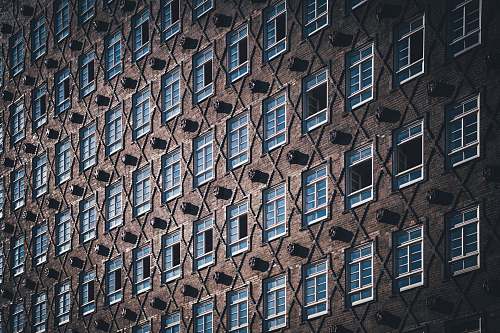 building brown and blue concrete building high rise
