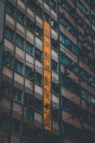 building brown and gray concrete building high rise