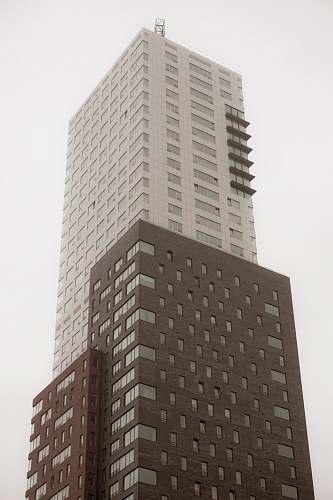 building brown and white painted building high rise