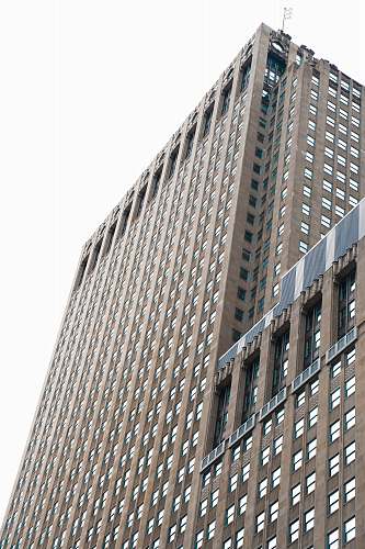 building brown concrete high-rise building during daytime urban