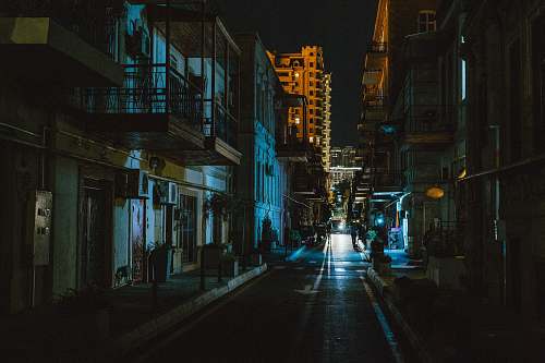 building buildings and road during night street