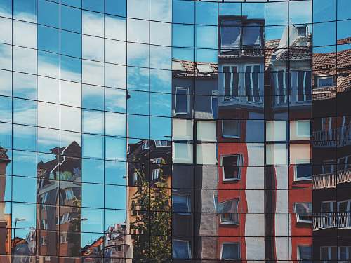 urban buildings reflection on glass building office building