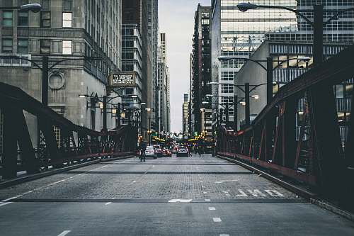 building cars on gray floor near buildings chicago