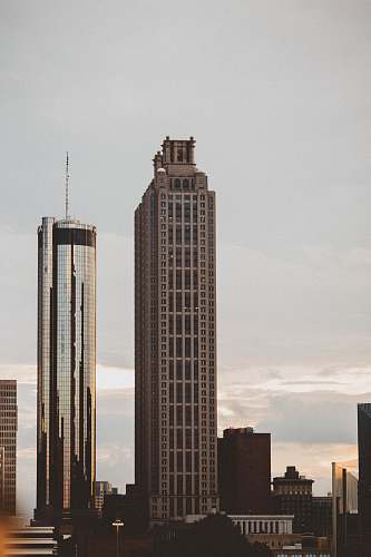 urban city buildings under cloudy sky during daytime building