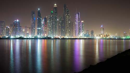 building cityscape with lights turned-on town