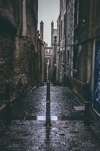 road empty pathway surrounded by buildings street