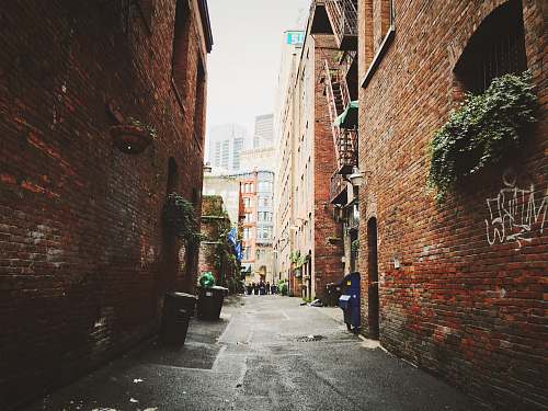 seattle gray concrete pathway through building brick