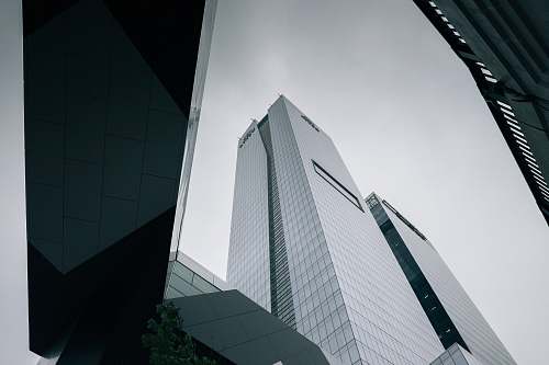 building high-rise building photography grey
