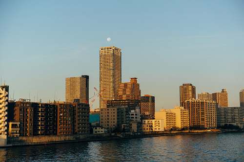 building high-rise buildings under clear blue sky high rise