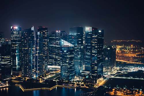 building landscape photography of city skyline at night cityscape