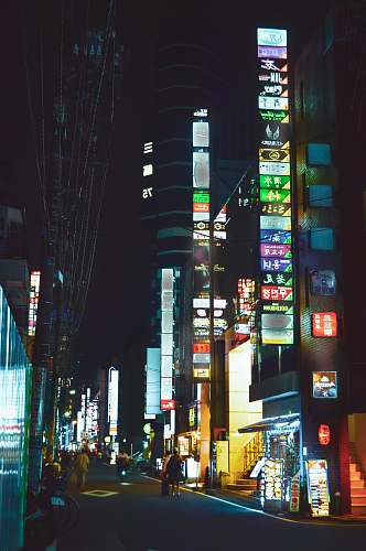 building lighted signage at night metropolis