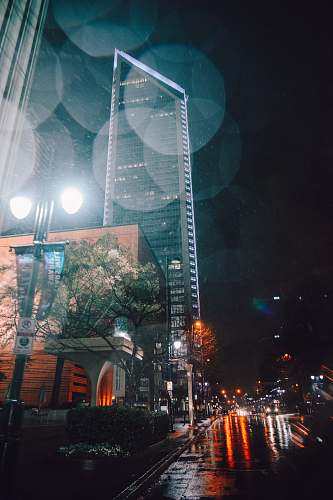 building low angle photo of building with bokeh lights urban
