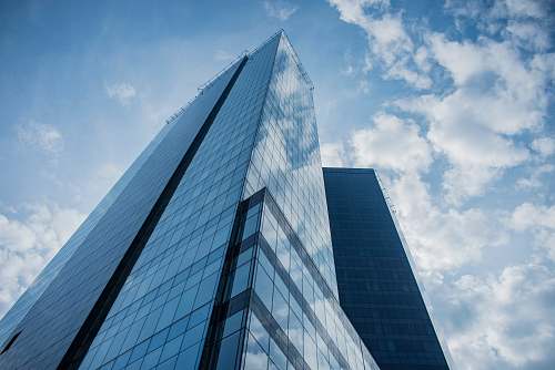 building low angle photo of high-rise building architecture