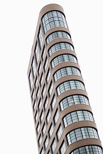 building low angle photography of brown concrete building architecture