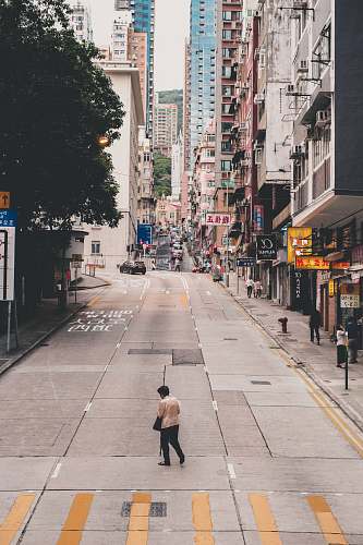 road man about to walk across the street street