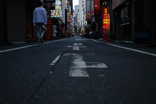 building man wearing blue dress shirt street