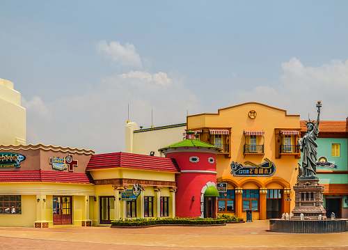 building multicolored concrete building during daytime town