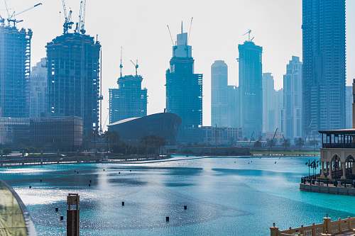 building ocean near high rise buildings metropolis