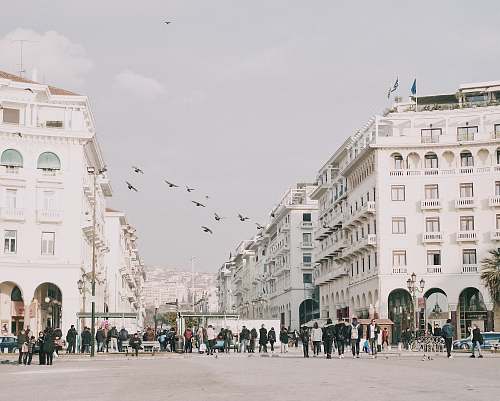 building people walking in plaza downtown