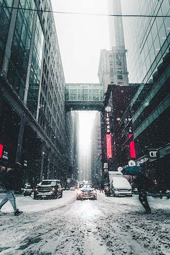 winter person walking on the street during day time urban