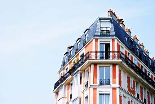 building red and white painted wall apartment complex urban