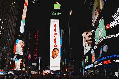 building time square with Danny Brown LED signage at nighttime metropolis