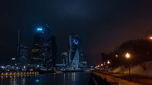 building twist building during nighttime metropolis