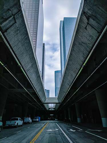 building underground highway at city during daytime skyscraper