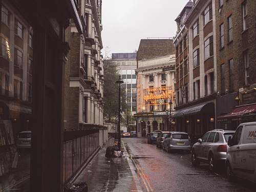 building vehicles beside buildings road
