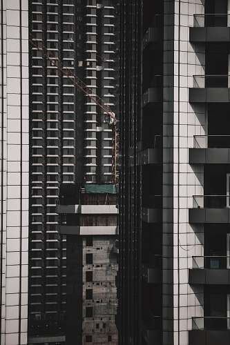 building white and black high-rise building high rise