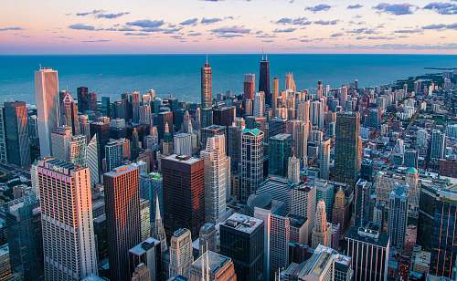 building white and brown city buildings during daytime architecture