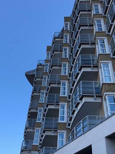 building white and brown concrete building high rise