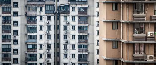 town white and brown concrete buildings high rise