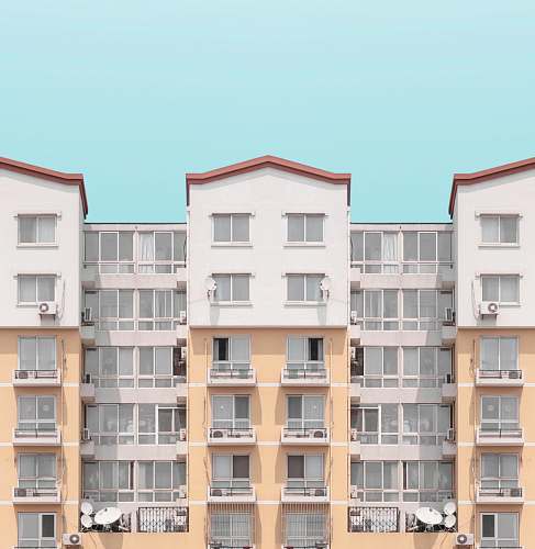 urban white and brown high-risebuilding town
