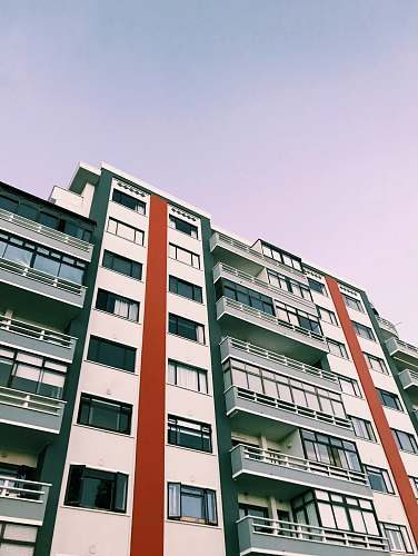 building white and green buildin high rise